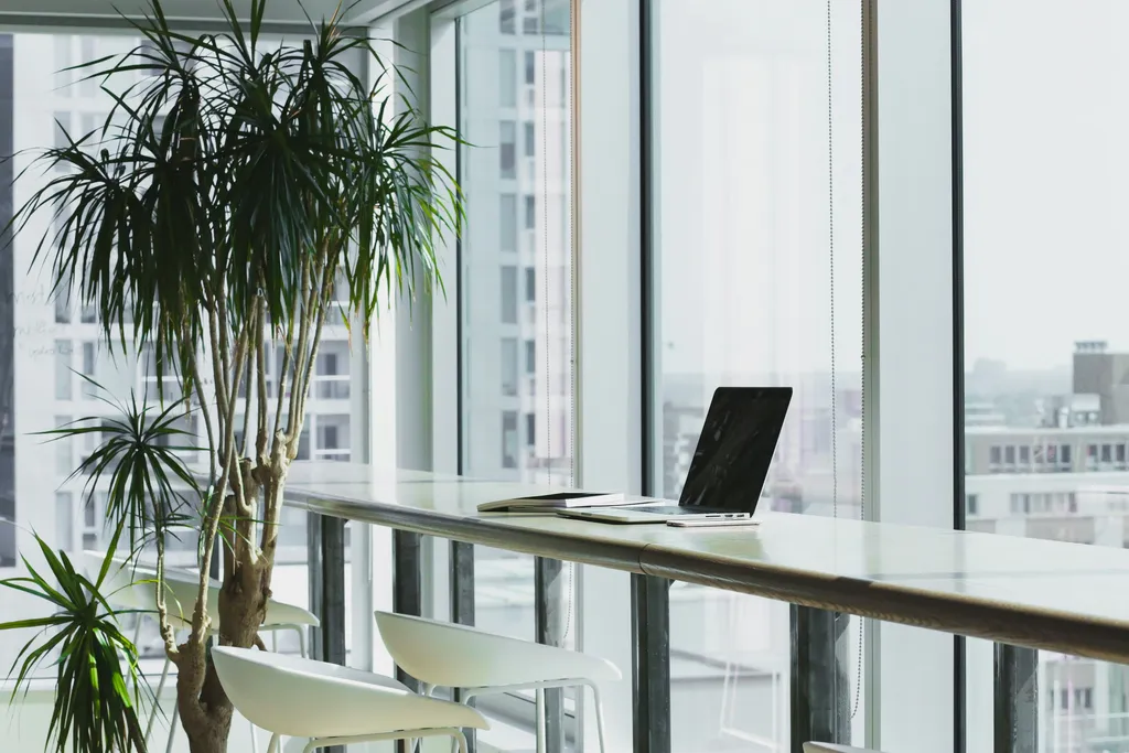 Modern office workspace with a laptop, representing Microsoft 365 productivity