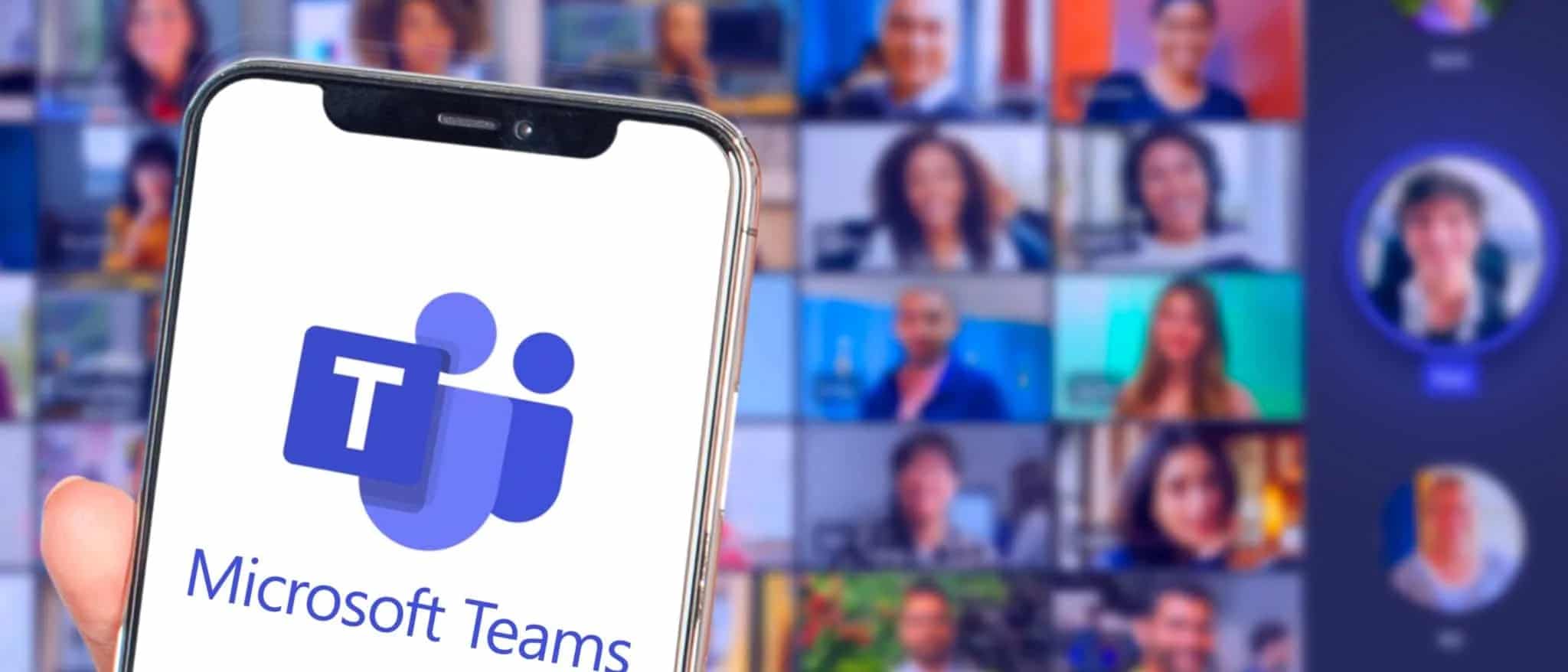 phone with microsoft teams app in front of a large audience in a video call