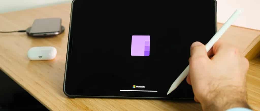 someone taking notes on tablet using Microsoft Office OneNote