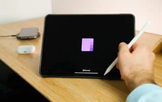 someone taking notes on tablet using Microsoft Office OneNote