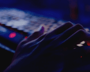 Hand on a keyboard potentially hacking